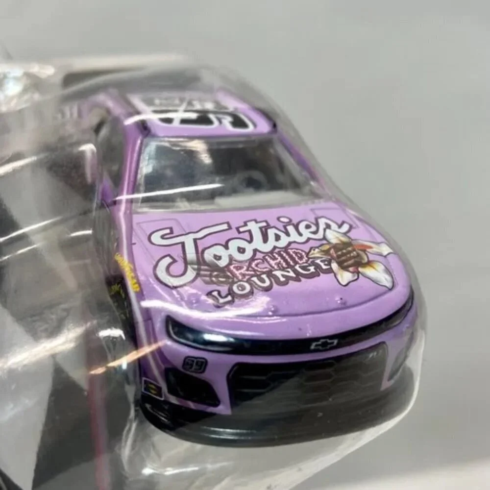 Nascar Authentics Tootsies Daniel Sua'rez 99 Wave 06 SKU-27661 Race Car NIP 2023